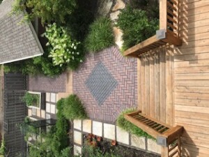 backyard paving with kitchen garden and edible landscape by landscape architect Acorn Landscapes in St loui missour